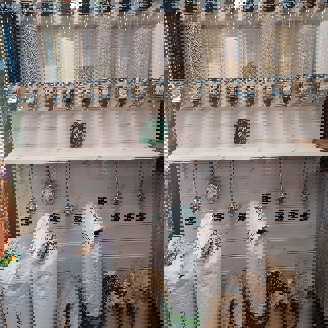 Bulk dispensers with organic beans, grains, flour and lentils at the SJH Farm Shop.