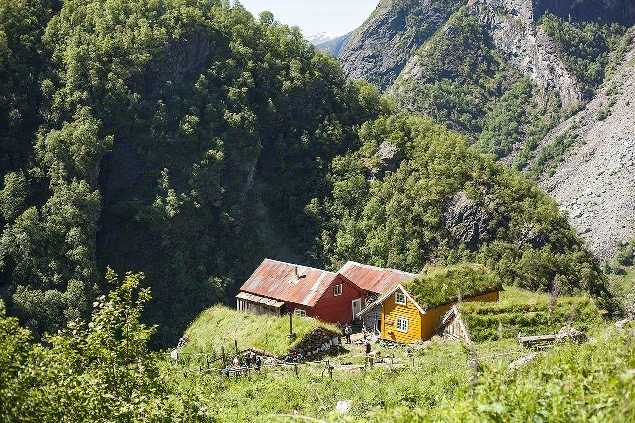 Traditional mountain farm (seter) in Aurlandsdalen used for summer farming as part of organic agriculture education in Norway.